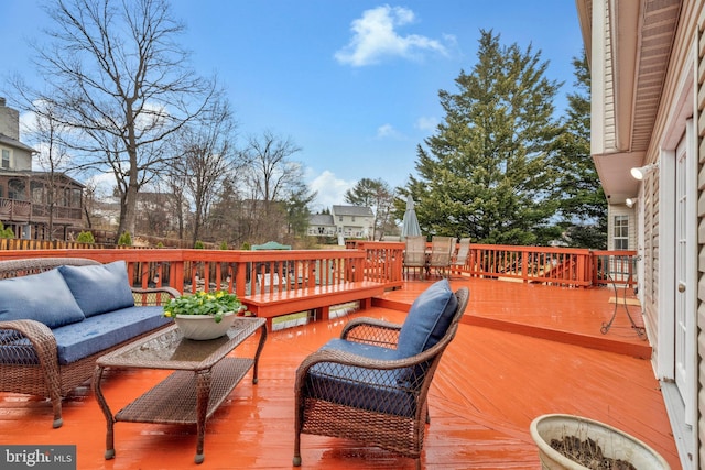 deck featuring an outdoor living space