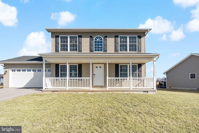 view of front of home with covered porch, a front lawn, and a garage