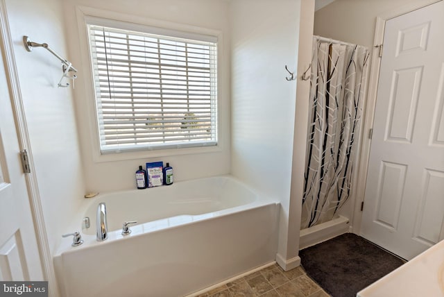 bathroom with independent shower and bath