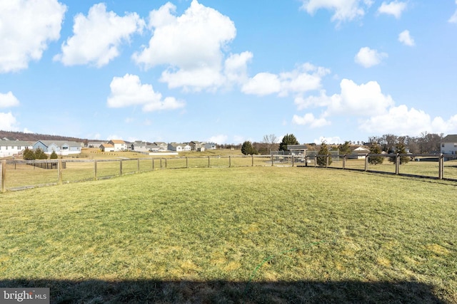 view of yard with a rural view