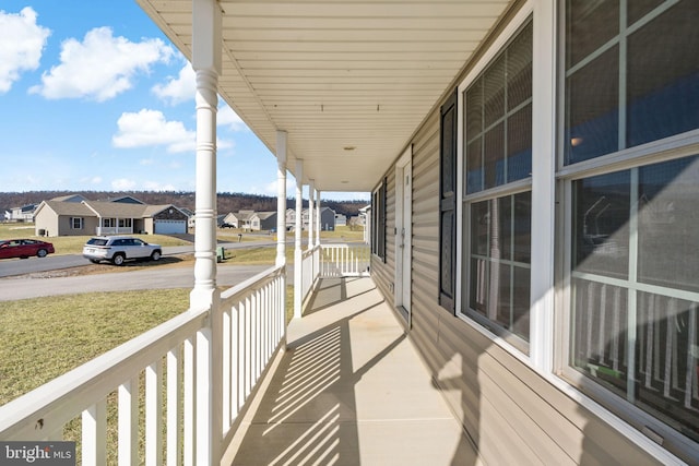 balcony featuring covered porch