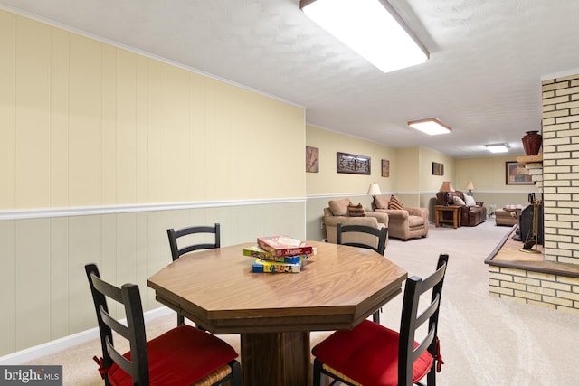 dining area featuring visible vents and light colored carpet