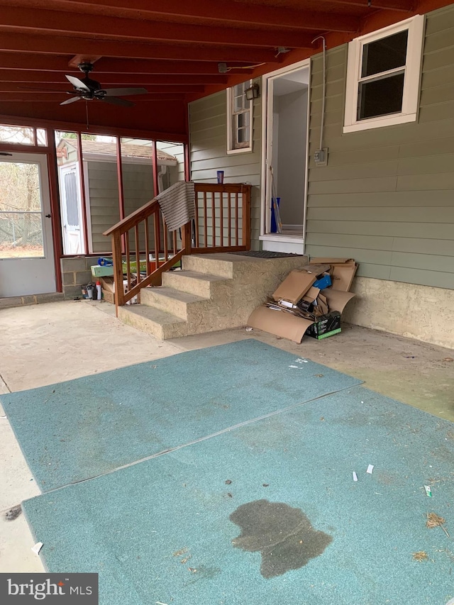 view of patio featuring a ceiling fan and entry steps