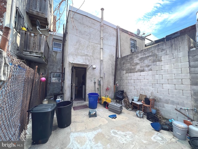 back of house featuring a patio area