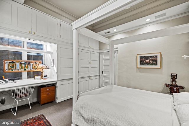 bedroom featuring recessed lighting, visible vents, dark carpet, and built in study area