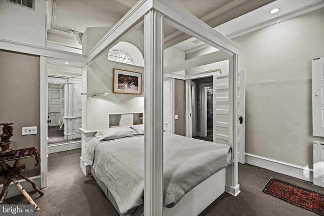 bedroom featuring baseboards, visible vents, dark carpet, and recessed lighting