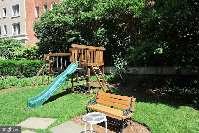 view of playground with a yard