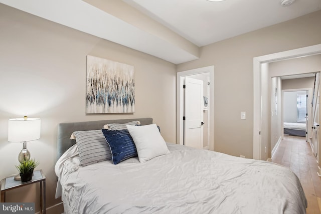 bedroom featuring hardwood / wood-style flooring