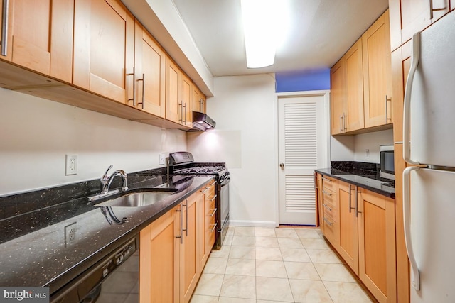 kitchen with light tile patterned flooring, range hood, sink, dark stone counters, and black appliances