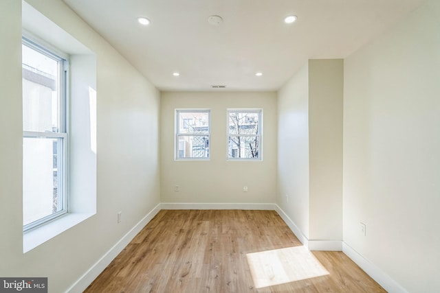 empty room featuring light hardwood / wood-style floors