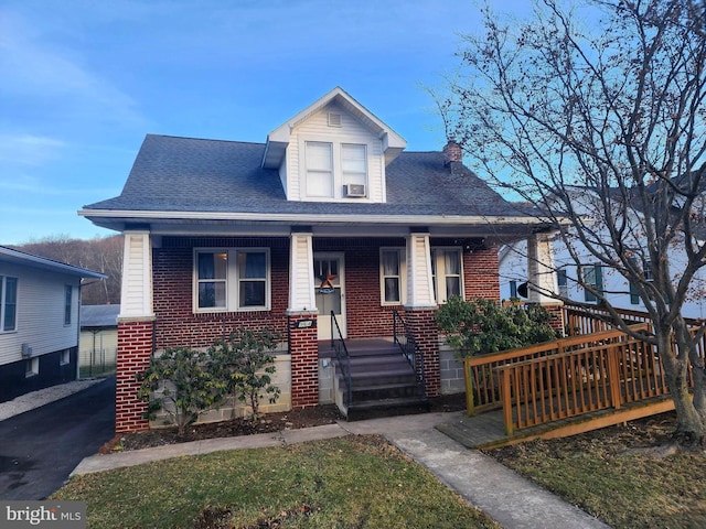 view of front of home featuring covered porch