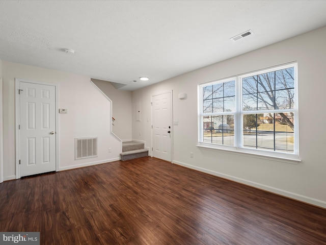 interior space with dark wood-type flooring