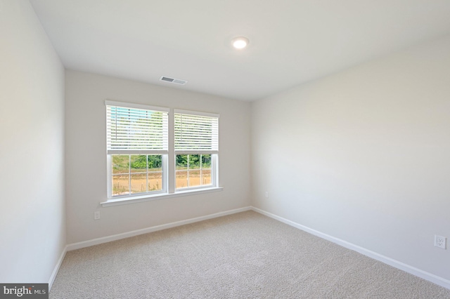 view of carpeted spare room