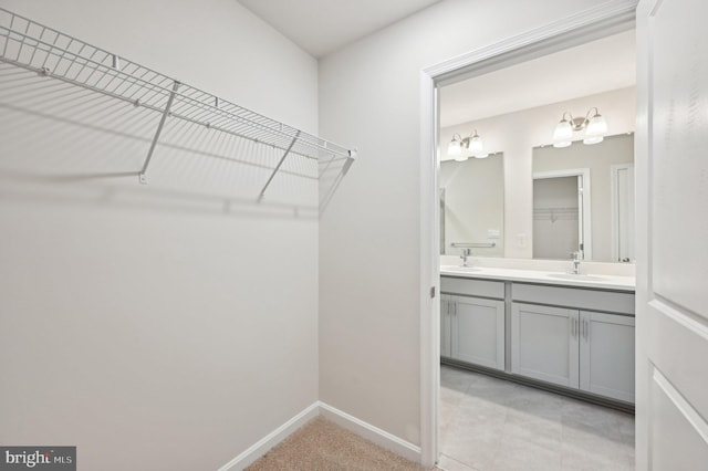 walk in closet with sink