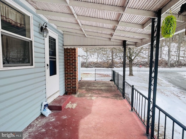 view of snow covered patio