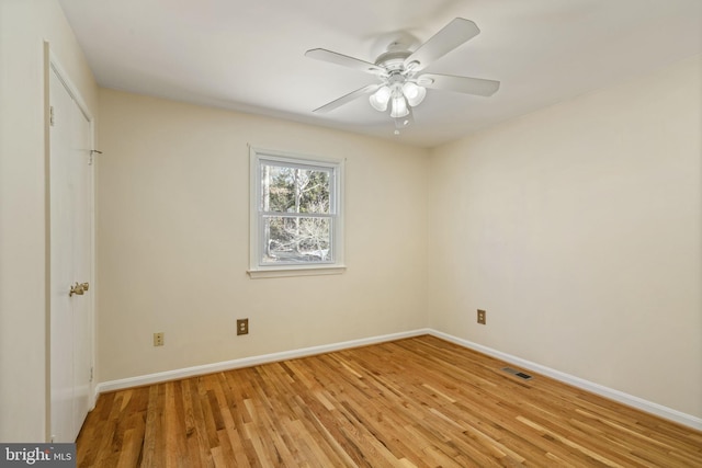 unfurnished bedroom with ceiling fan and light hardwood / wood-style flooring