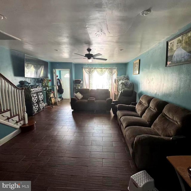 living room featuring ceiling fan