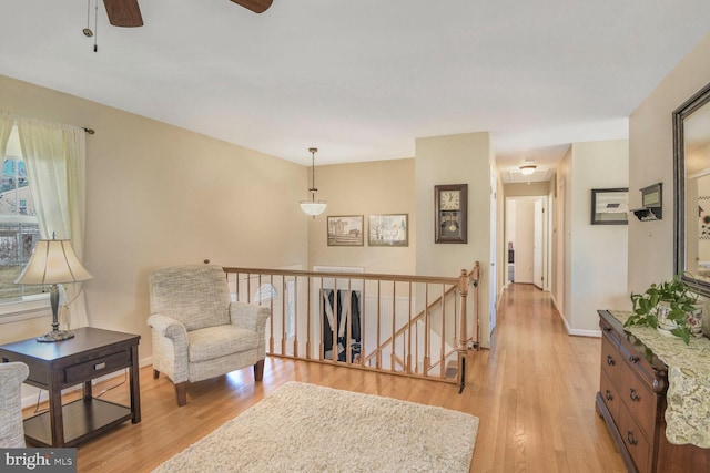 living area with light hardwood / wood-style floors