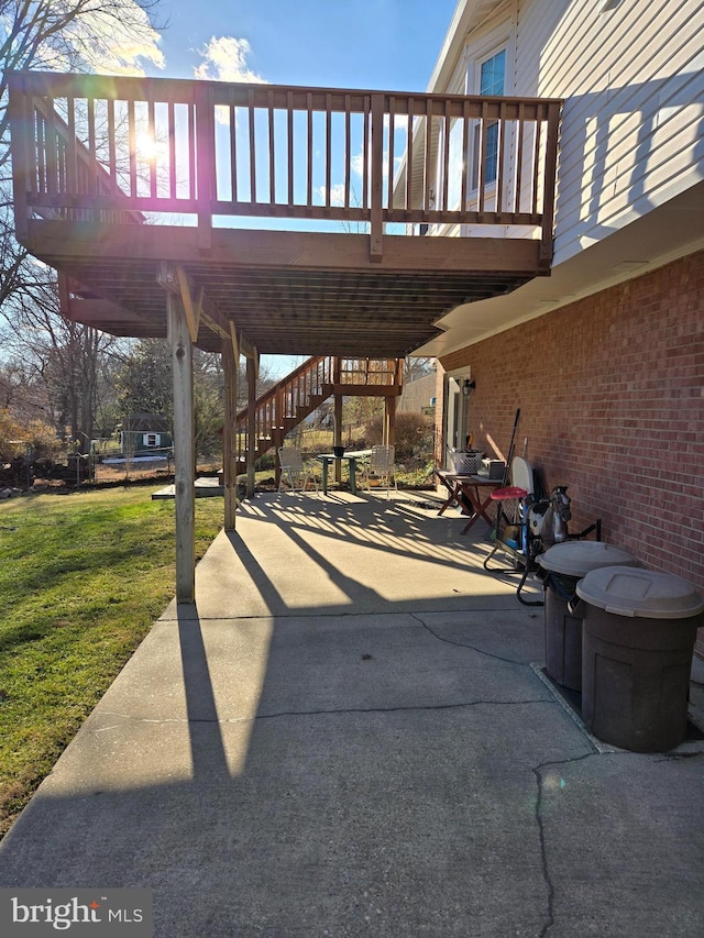 view of patio with a wooden deck