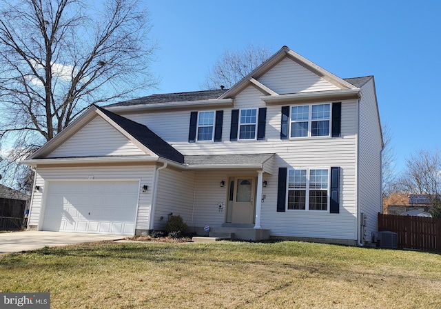 view of front facade featuring a garage, central AC unit, and a front lawn