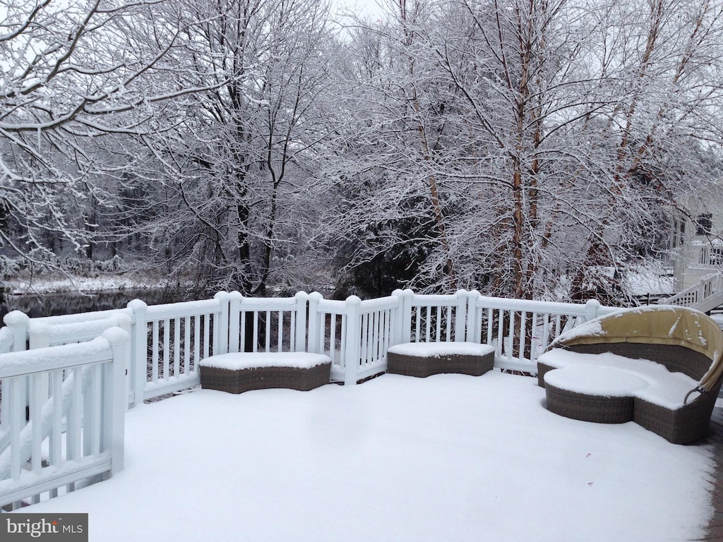 view of snow covered deck