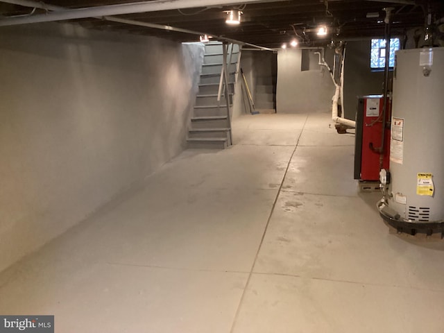 basement featuring gas water heater