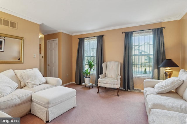 living room with a healthy amount of sunlight, carpet flooring, and ornamental molding