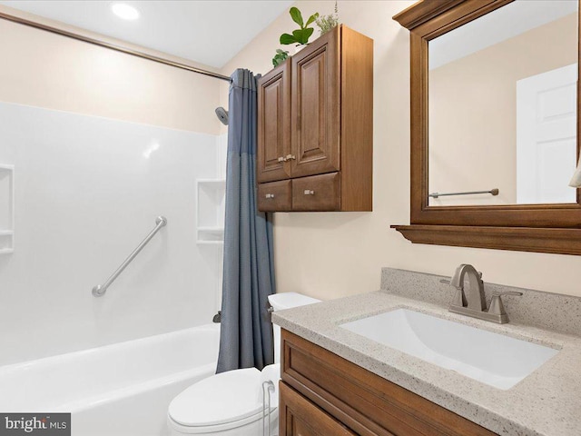 bathroom featuring toilet, vanity, and shower / bath combination with curtain