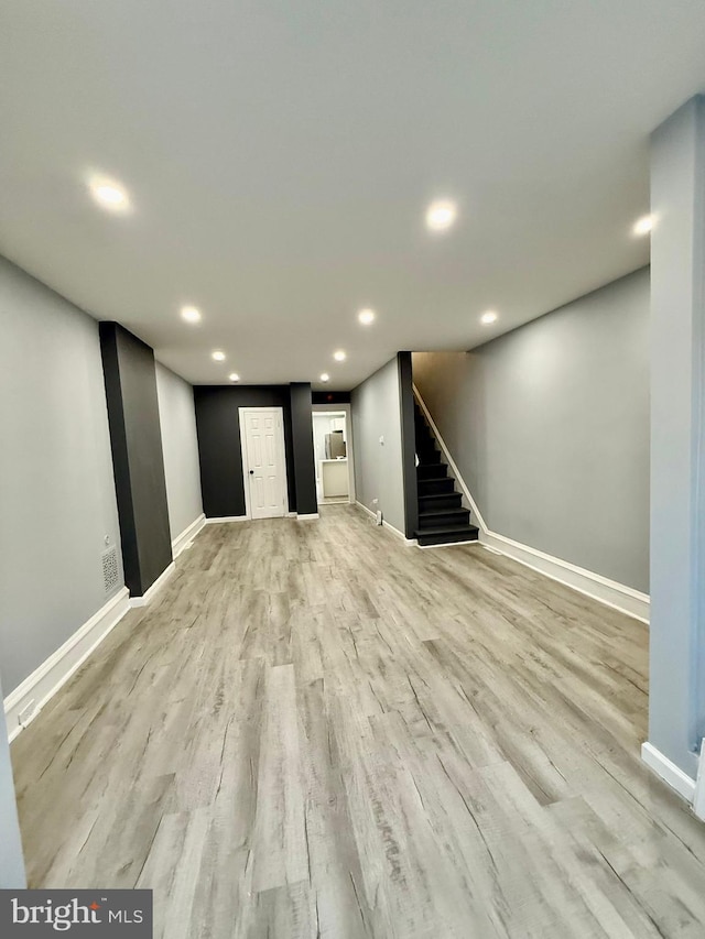 basement with light wood-type flooring