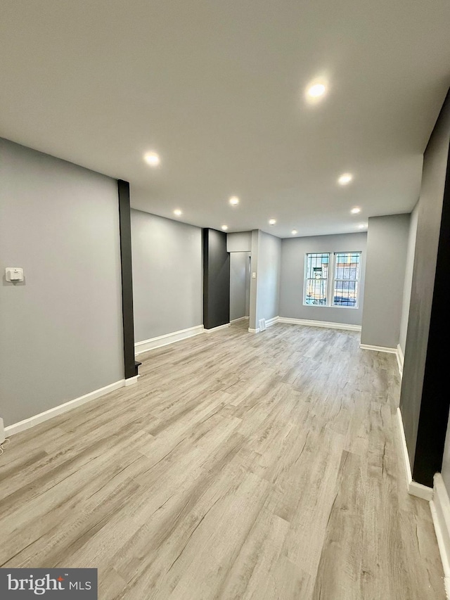 basement with light wood-type flooring