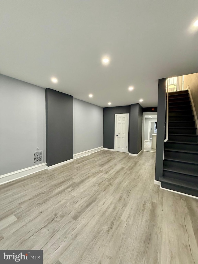 basement with light wood-type flooring