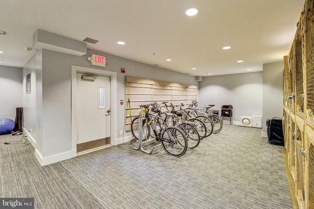 garage with recessed lighting, bike storage, and baseboards