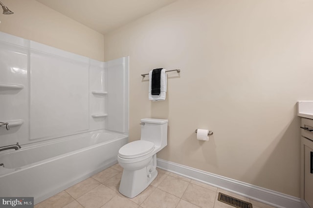 full bathroom featuring bathing tub / shower combination, toilet, vanity, and tile patterned flooring