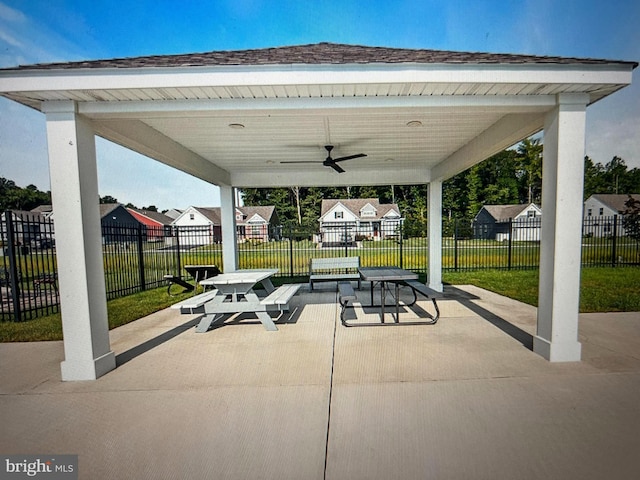 view of community featuring a yard and a patio area