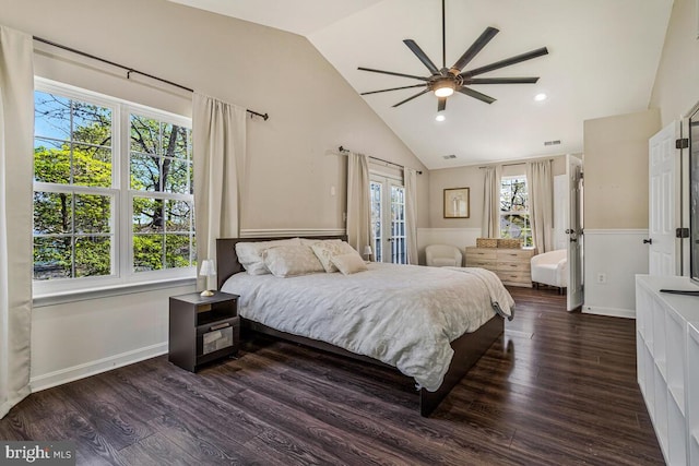 bedroom with recessed lighting, dark wood finished floors, lofted ceiling, and multiple windows