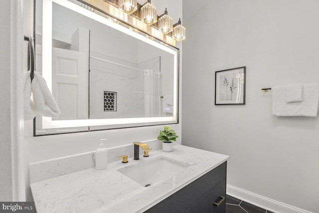 bathroom featuring vanity and walk in shower