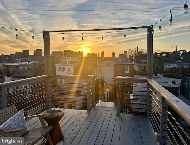 view of balcony at dusk