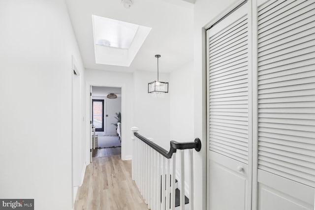 corridor featuring light wood-type flooring