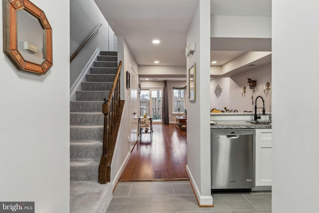 interior space with tile patterned flooring and sink