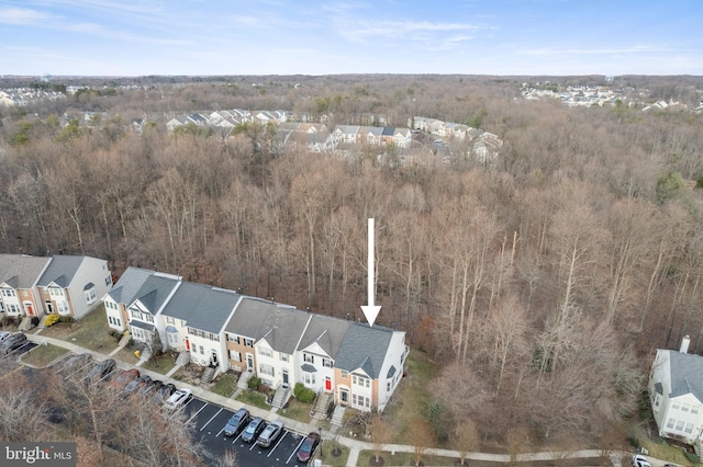 bird's eye view with a residential view and a view of trees