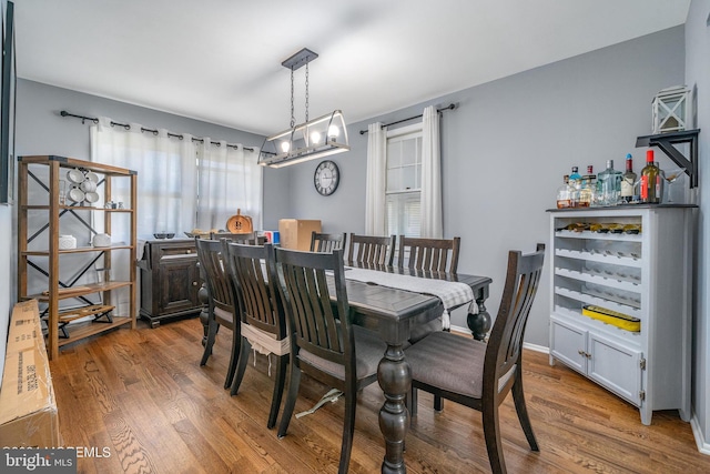 dining space featuring hardwood / wood-style flooring