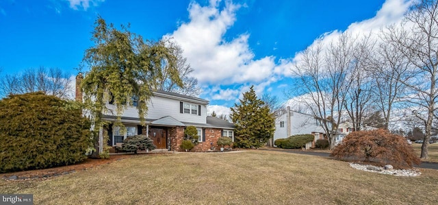 view of property featuring a front yard