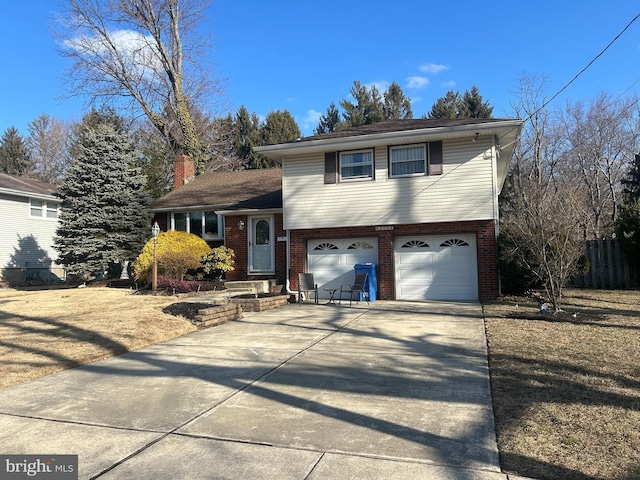 split level home with a garage