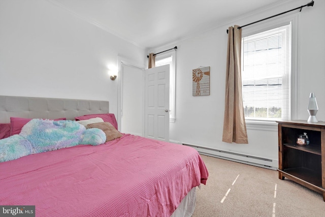 carpeted bedroom featuring ornamental molding and baseboard heating