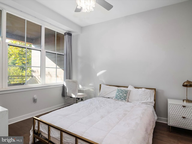 bedroom featuring dark wood-type flooring