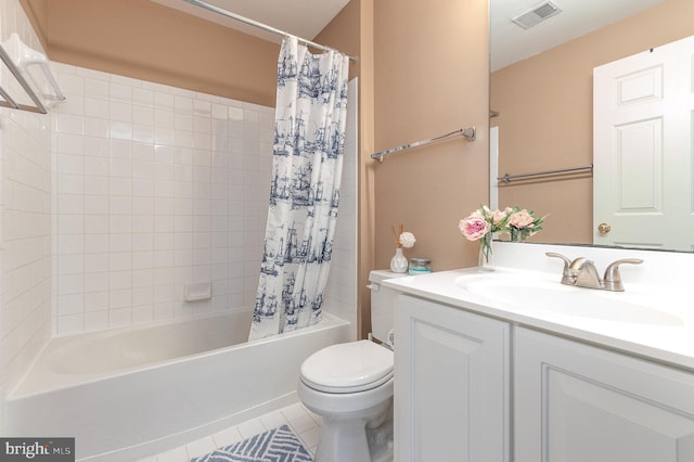 full bathroom featuring tile patterned flooring, toilet, vanity, visible vents, and shower / tub combo with curtain