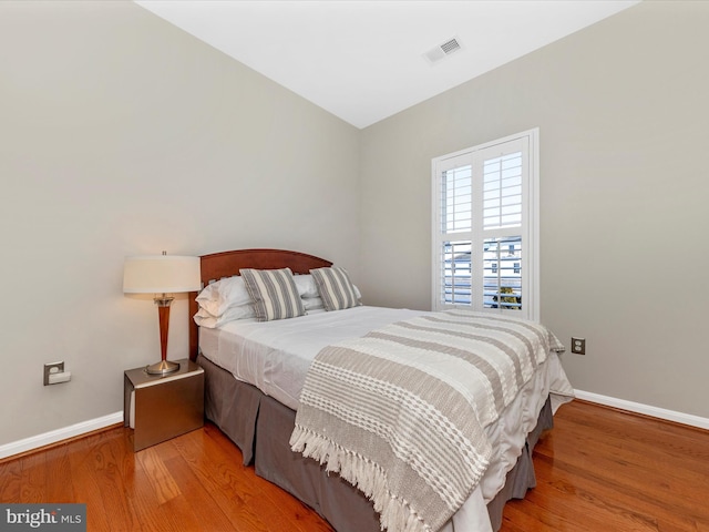 bedroom featuring light hardwood / wood-style floors