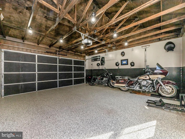 garage featuring a garage door opener