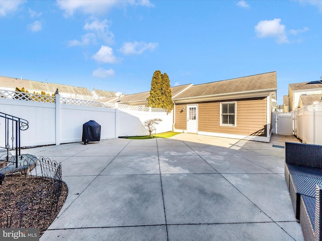 back of property with a patio area