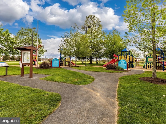 view of play area with a yard